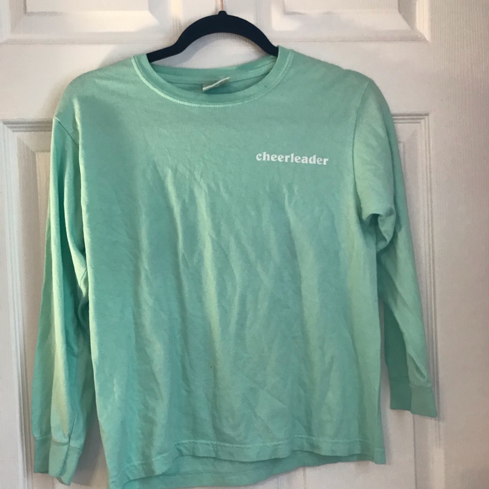 Cheerleader Patagonia looking shirt